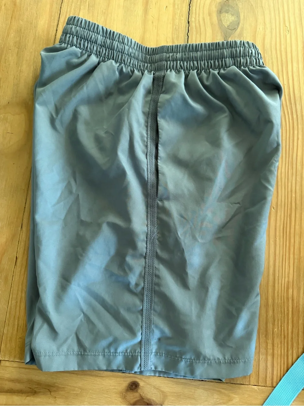 Nike Light Gray Athletic Shorts with White Swoosh